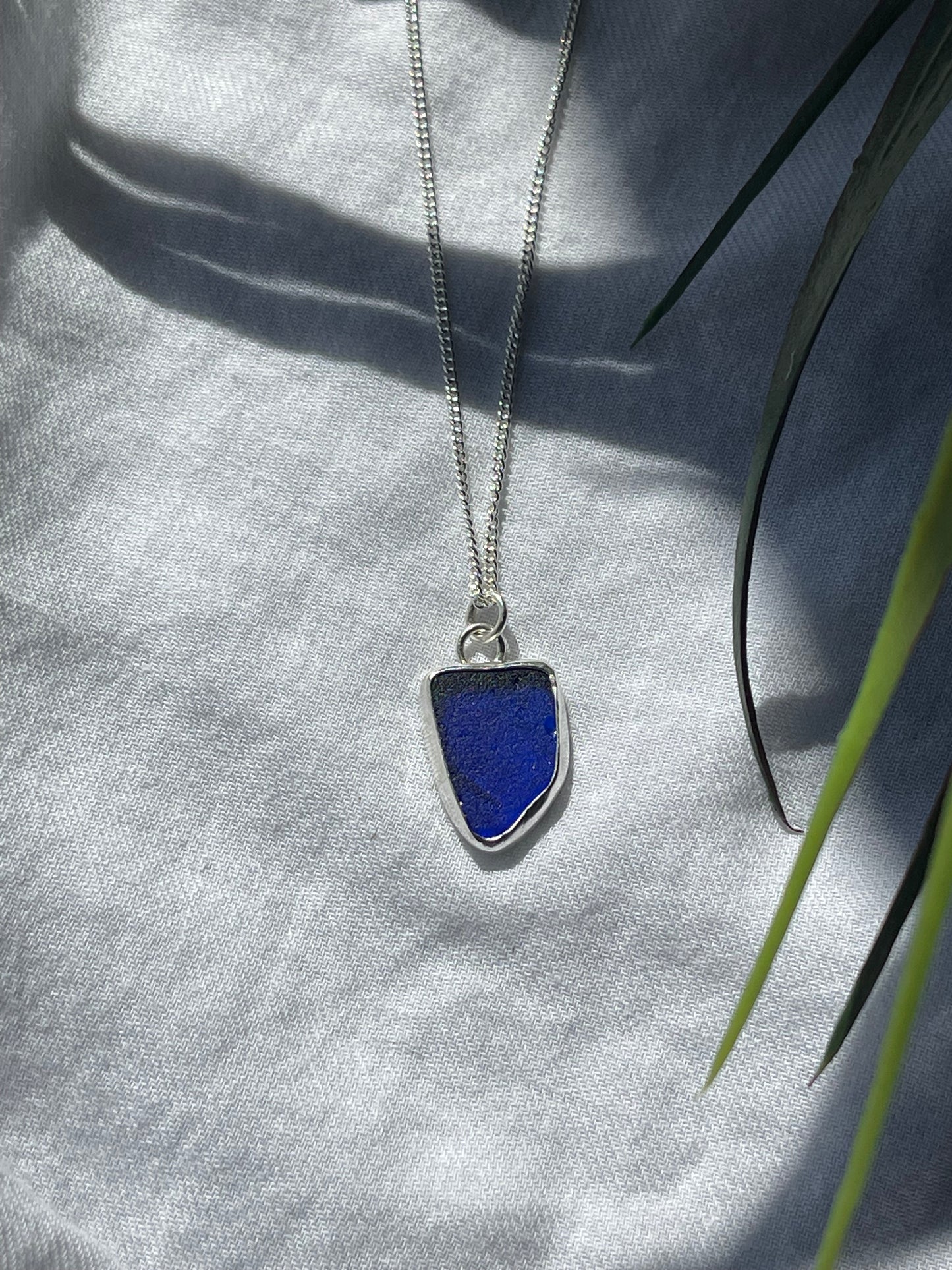 Dark blue sea glass necklace