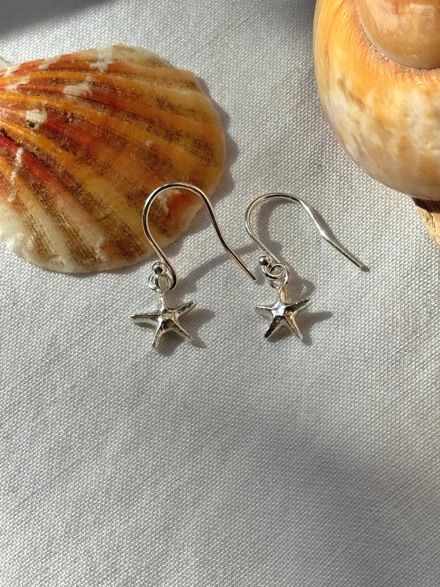 Starfish earrings.