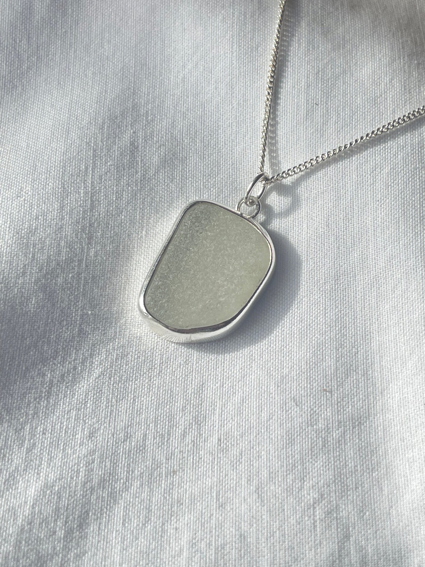 White Sea glass pendant